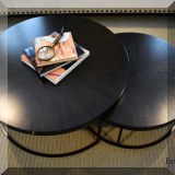 F04. Mitchell Gold round nesting coffee tables. 14.5”h x 35.5”w 